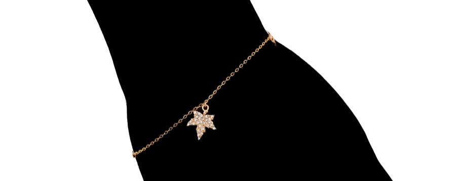 Delicate Gold Chain Bracelet with Leaf and Floral Charms and Sparkling Crystals