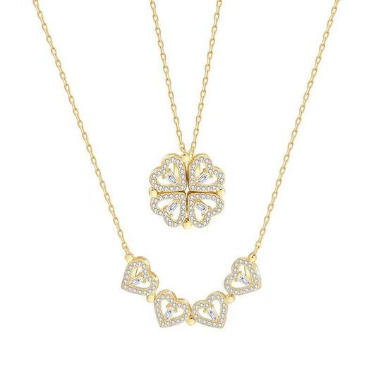 32lavender gold plated titanium steel necklace with a transformable four leaf clover pendant made of hearts and cubic zirconia.