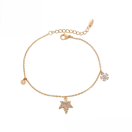 Delicate Gold Chain Bracelet with Leaf and Floral Charms and Sparkling Crystals