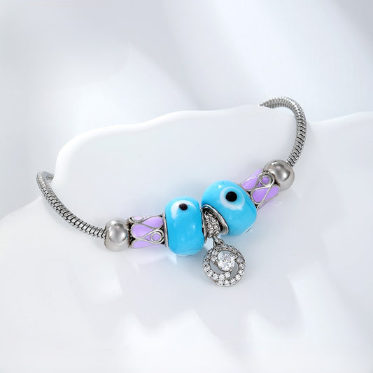 Platinum Plated Charm Bracelet | Ocean Blue Murano Glass Swirl Bead