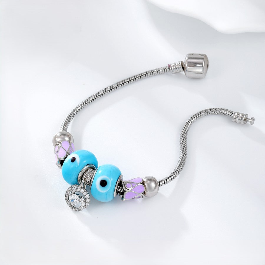 Platinum Plated Charm Bracelet | Ocean Blue Murano Glass Swirl Bead